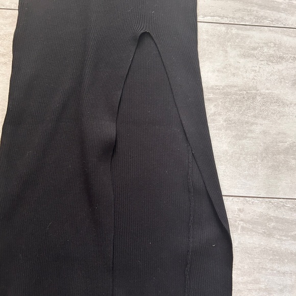 Moocci size M/L stretch black dress with thigh high split - Picture 4 of 4